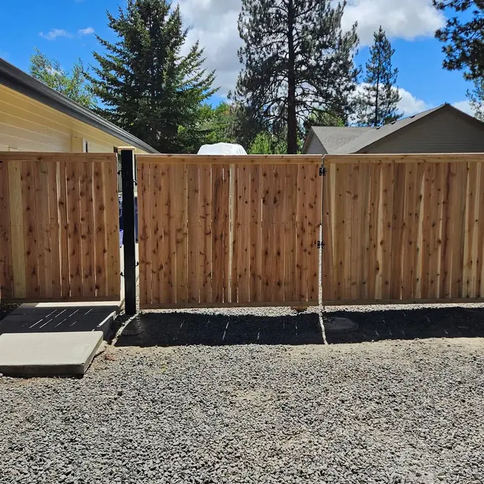 Entry gate between fence runs