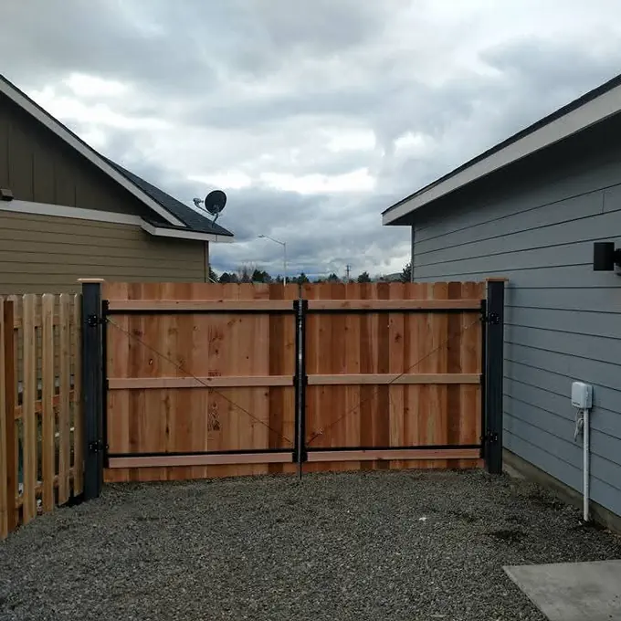 Wood gate between buildings