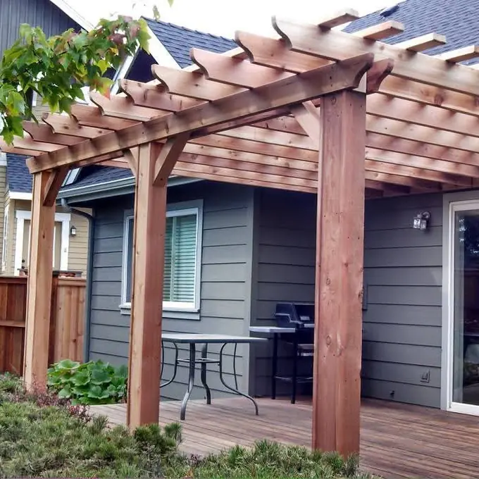 Wood pergola next to the home